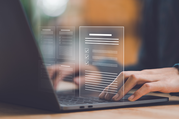 A person typing on a computer